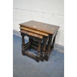 A SOLID OAK NEST OF THREE TABLES, width 53cm x depth 35cm x height 47cm (condition:-surface
