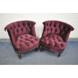 A PAIR OF BURGUNDY BUTTONED CHAIRS, with black painted legs