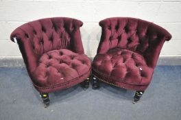 A PAIR OF BURGUNDY BUTTONED CHAIRS, with black painted legs