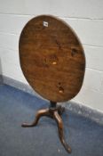 A GEORGIAN MAHOGANY OVAL TILT TOP TRIPOD TABLE, width 66cm x depth 56cm x height 70cm