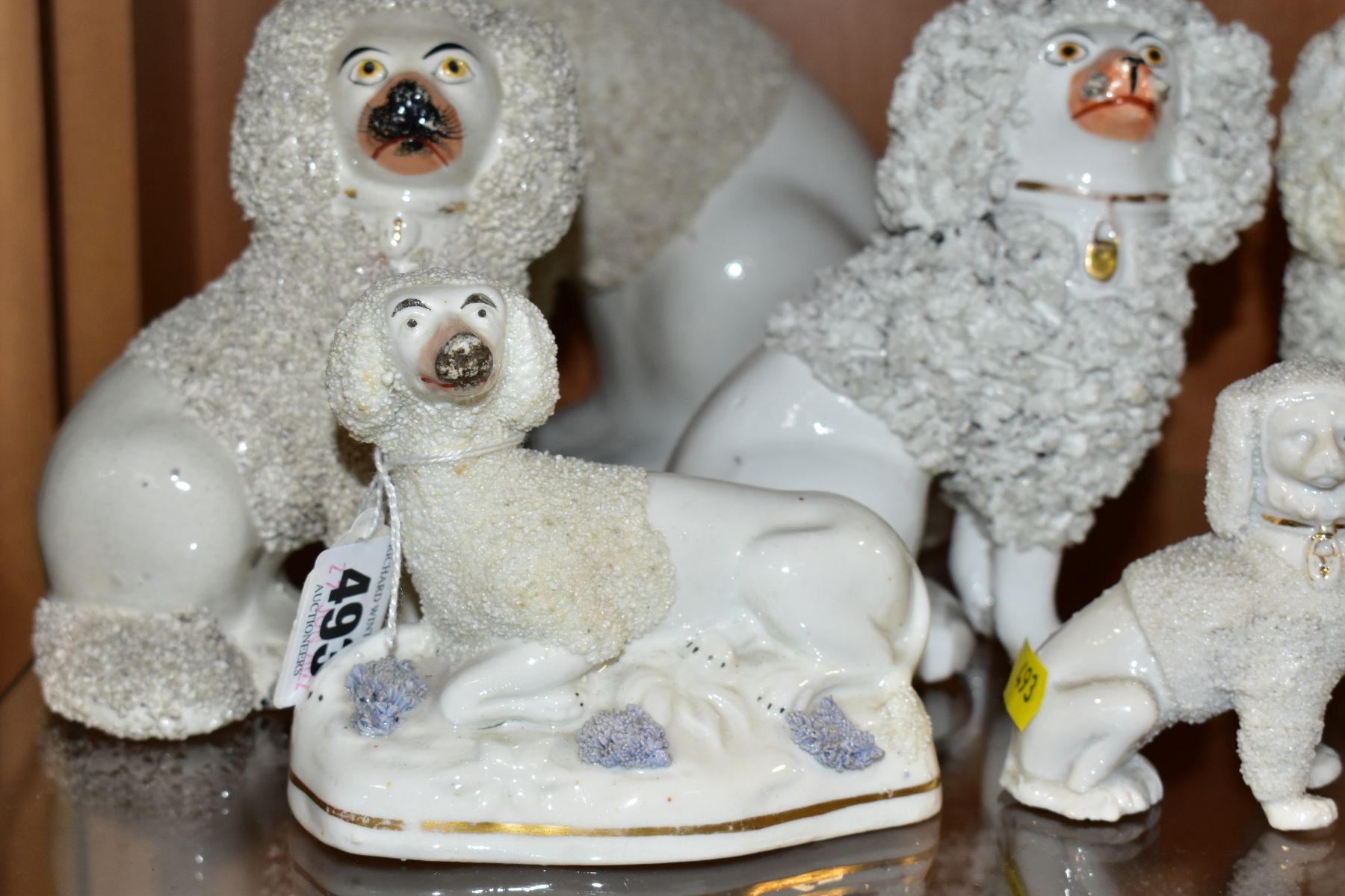 SIX VICTORIAN STAFFORDSHIRE WHITE GLAZED AND FRIT DECORATED POODLE FIGURES AND A SIMILAR SMALL - Bild 3 aus 6