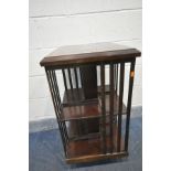 AN EDWARDIAN STYLE MAHOGANY AND INLAID REVOLVING BOOKCASE, 46cm squared x height 85cm (condition -