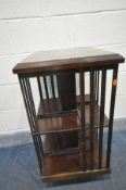 AN EDWARDIAN STYLE MAHOGANY AND INLAID REVOLVING BOOKCASE, 46cm squared x height 85cm (condition -