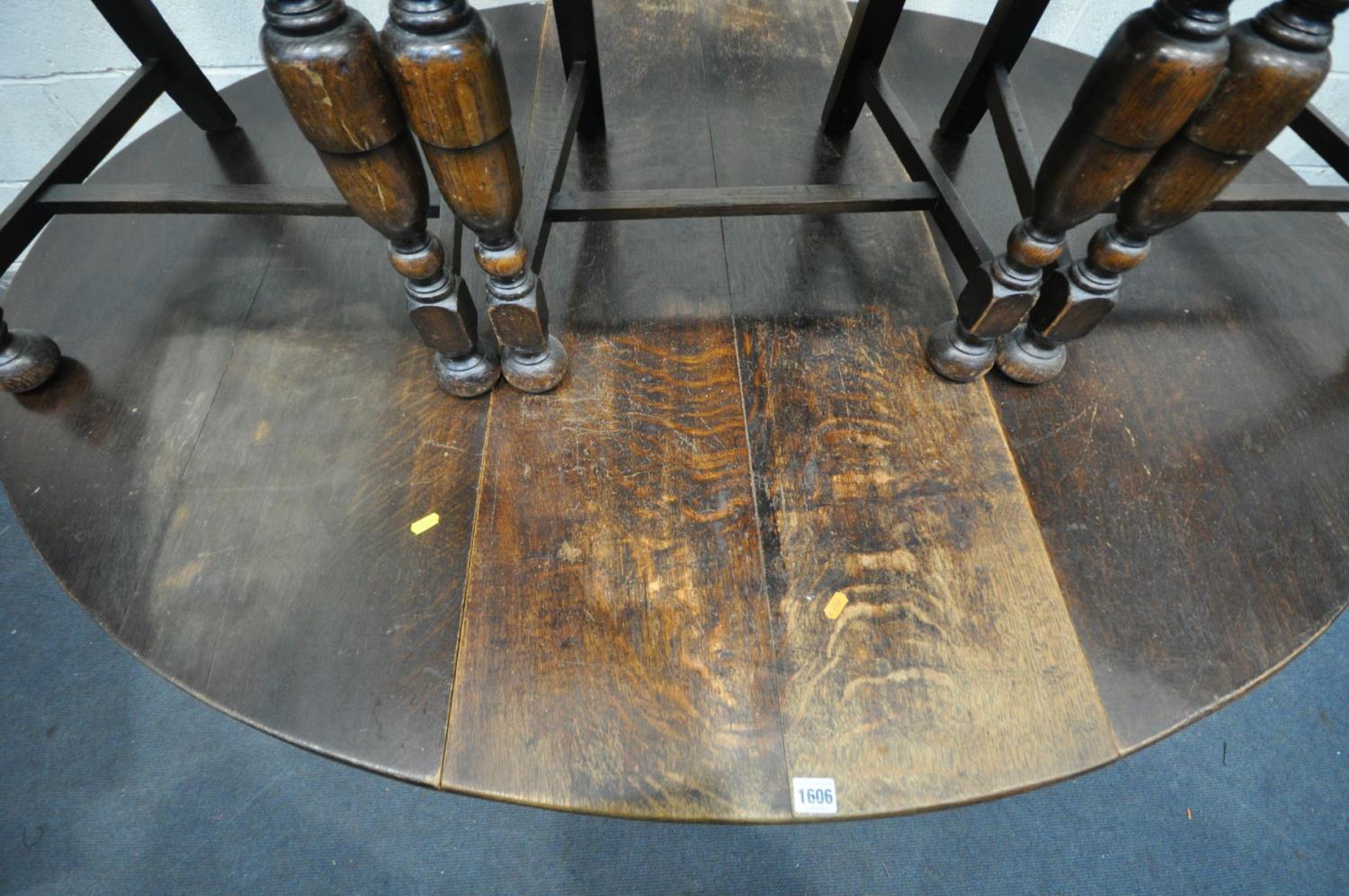 A GEORGIAN AND LATER OAK GATE LEG TABLE, with , turned cylindrical legs, united by stretchers, - Bild 3 aus 5
