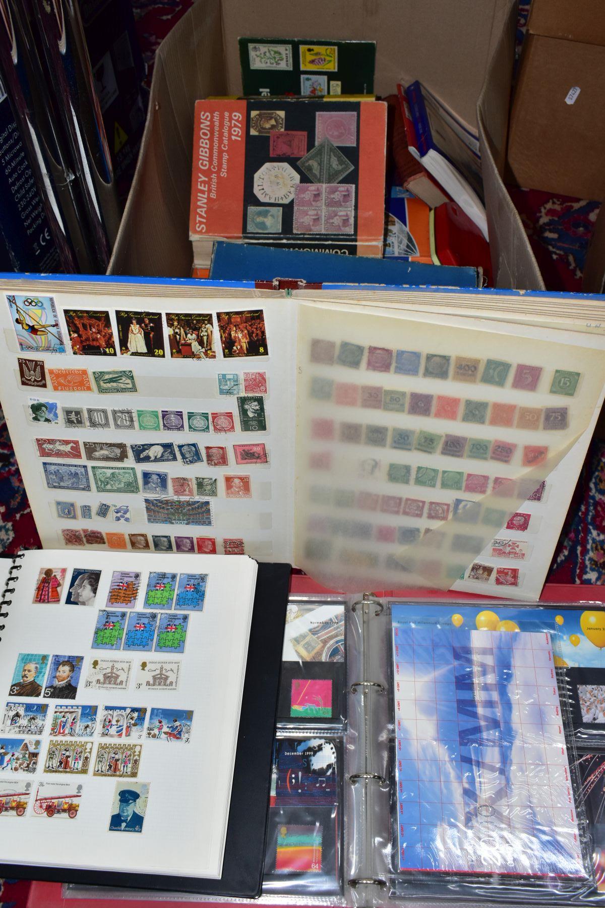 COLLECTION OF STAMPS AND STAMP CATALOGUES in a large box main value in twenty four Millennium