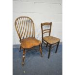 A REPRODUCTION ELM WINDSOR CHAIR, with a crinoline stretcher (condition:-animal scratches/bite marks