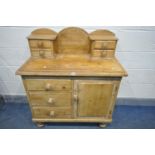 A VICTORIAN PINE SIDEBOARD, a raised back with four drawers, the base with three drawers and a