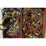 TWO BOXES OF COSTUME JEWELLERY, mostly plastic beaded necklaces, imitation pearl necklaces,