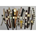 A TIN OF ASSORTED WRISTWATCHES, mostly quartz movements, to include ladies and gents watches with