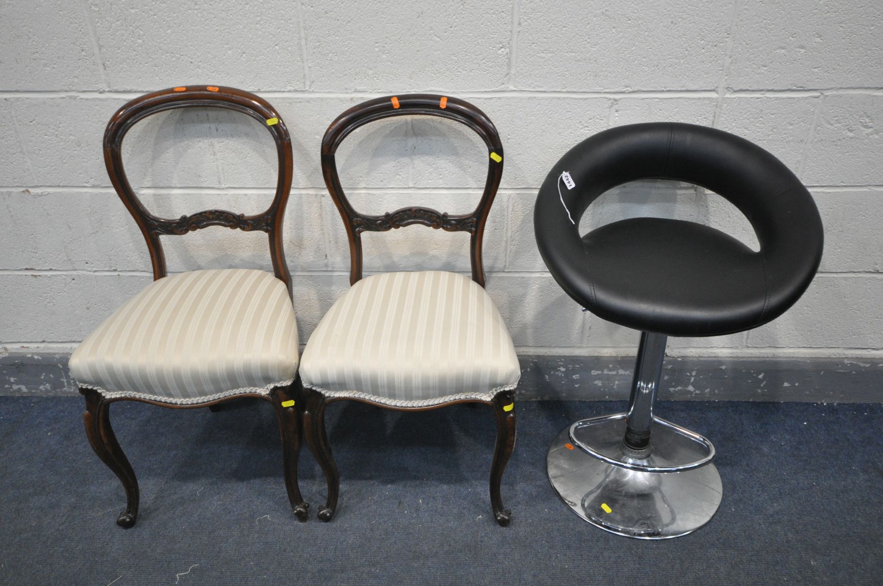 A PAIR OF VICTORIAN ROSEWOOD DINING CHAIRS (some repairs to back) along with a black leatherette