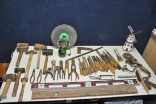 A BOX OF HAND TOOLS to include selection of chisels, snips, wood hammers, copper hammers, cutting