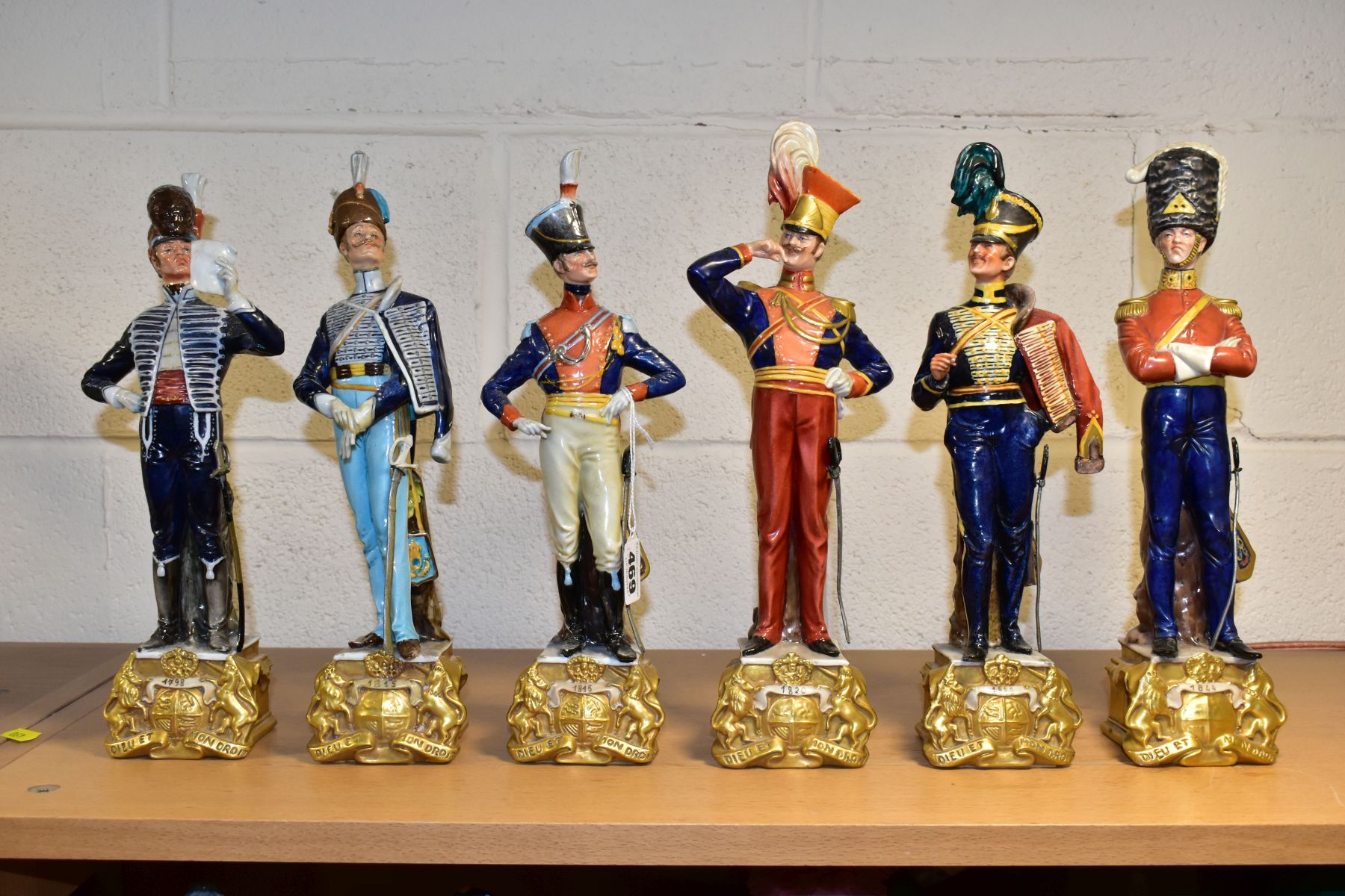 SIX CAPODIMONTE BRUNO MERLI FIGURES OF SOLDIERS IN HISTORICAL COSTUME OF 1798-1844, modelled as
