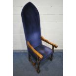 A LATE 20TH CENTURY OAK TALL THRONE CHAIR, with blue upholstery, scrolled open armrests, cylindrical