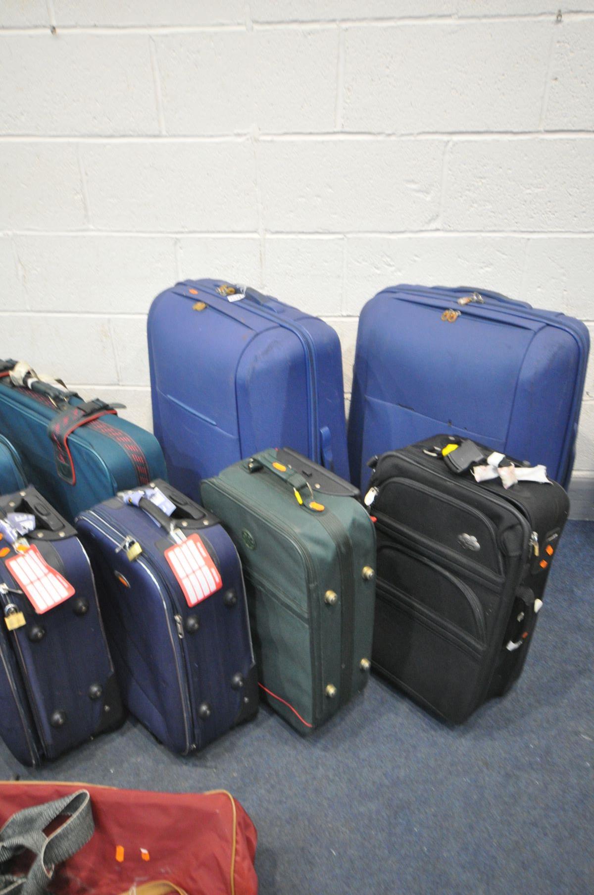 A LARGE SELECTION OF SUITCASES, of various ages and sizes (10+) - Bild 2 aus 4