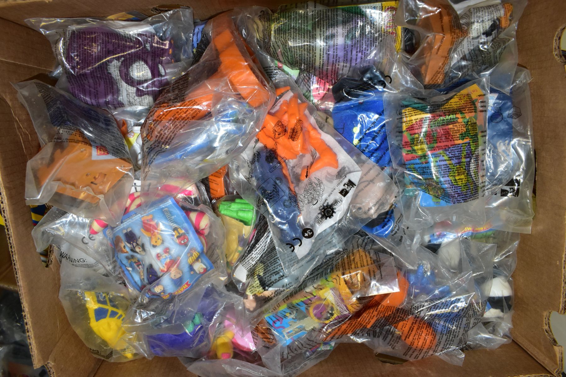 FOUR BOXES CONTAINING OVER 200 MCDONALDS HAPPY MEAL TOYS, IN SEALED PACKETS (DISNEY ETC) , also a - Bild 4 aus 5