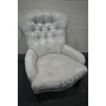 A VICTORIAN SPOON BACK CHAIR, with ice blue and floral upholstery, on turned front legs and brass