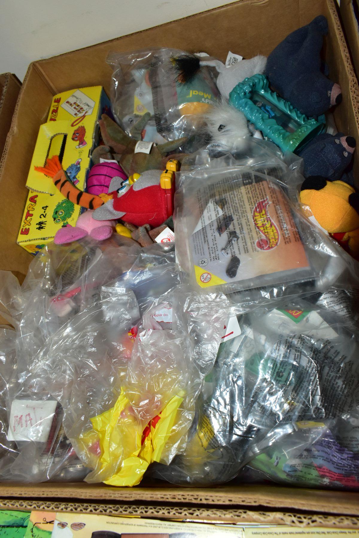 FOUR BOXES CONTAINING OVER 200 MCDONALDS HAPPY MEAL TOYS, IN SEALED PACKETS (DISNEY ETC) , also a - Bild 3 aus 5
