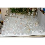 A QUANTITY OF CUT CRYSTAL AND OTHER GLASSWARES, over eighty pieces, to include a ships decanter, two