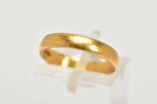 A 22CT GOLD BAND RING, plain polished band, approximate band width 3.4mm, personal engraving to