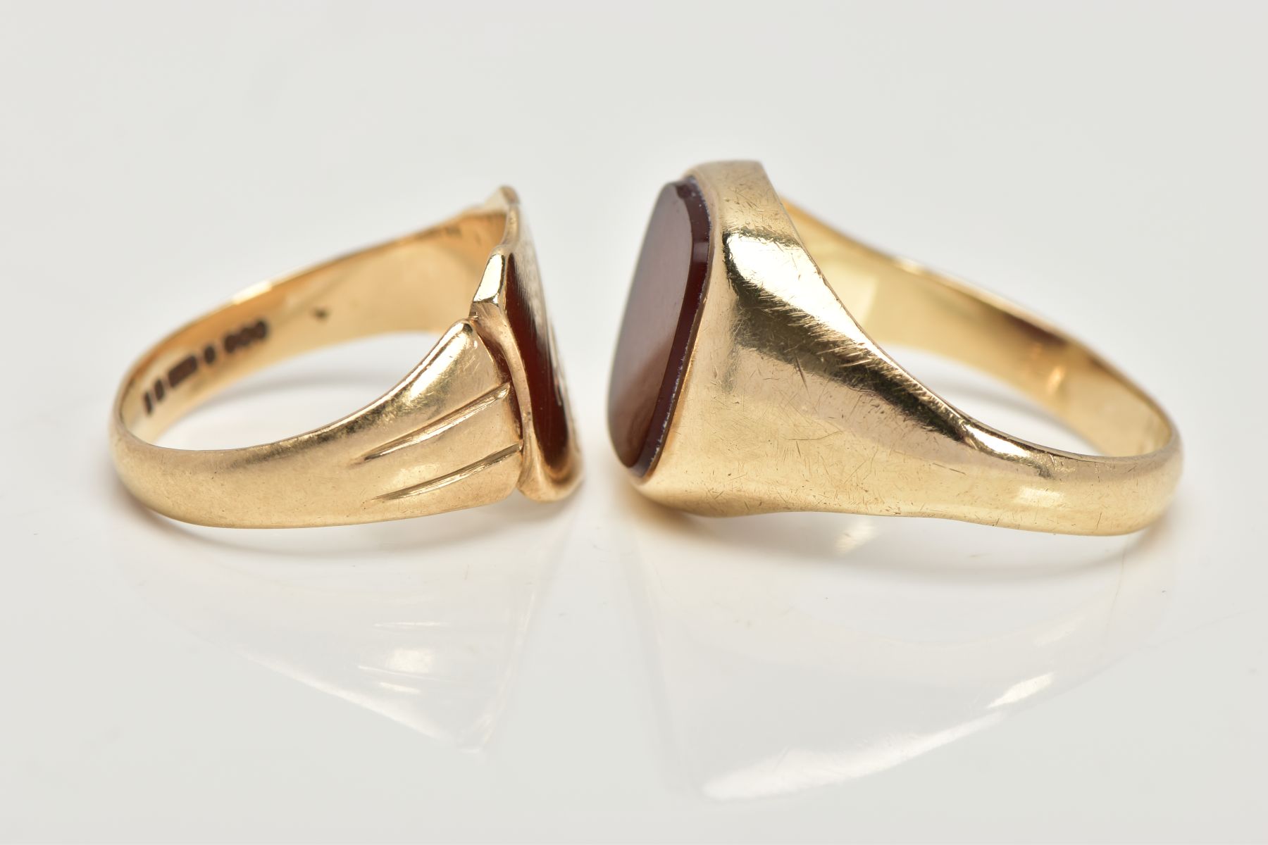 TWO 9CT GOLD SIGNET RINGS, the first set with a square cut carnelian, leading onto a tapered - Image 2 of 4