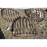 A VINTAGE CAST IRON CORNER HAY FEEDER, width 80cm x height 84cm, and a pair of vintage cast iron