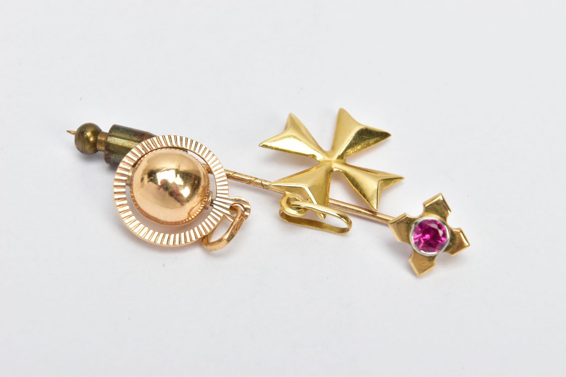 TWO YELLOW METAL CHARMS AND A STICK PIN, to include a puffy Maltese cross charm fitted with an - Image 3 of 3