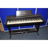 A YAMAHA PDP100 DIGITAL PIANO with some faulty keys but (PAT pass and working)