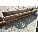 TWO GALVANISED FEEDING TROUGHS, one wall mounted, longest length 205cm (condition:-both well