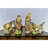 EIGHT ROYAL WORCESTER BIRD FIGURES AND GROUP, comprising 'Sparrow' 3236, 'Thrush' 3234 (chipped