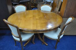 A WESELEY-BARRELL CHERRYWOOD EXTENDING PEDESTAL DINING TABLE, with two additional leaves, extended