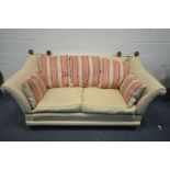 A KNOWLE STYLE CREAM UPHOLSTERED TWO SEATER SOFA, with tie back drop arms, on turned legs, width