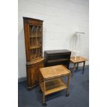 A MID CENTURY OAK TEA TROLLEY with an extending top (condition:-water stains to the top) a yew