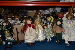 SIX BOXES AND A DOLL'S PRAM OF COLLECTORS DOLLS, to include forty two dolls, many boxed, tallest