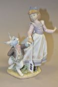 A LLADRO FIGURE, Alice in Wonderland No5740, designed by Jose Luis Alvarez 1991, retired 1998,