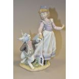 A LLADRO FIGURE, Alice in Wonderland No5740, designed by Jose Luis Alvarez 1991, retired 1998,