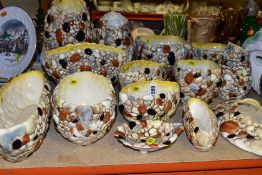 A QUANTITY OF SYLVAC, comprising fourteen of the fifteen 'Pebbles' range planters and vases (3350,