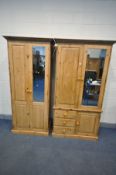 A PINE DOUBLE DOOR WARDROBE, one door with a single mirror, above three drawers and cupboard door,