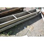 A PAIR OF GALVANISED WALL MOUNTED FEEDING TROUGHS, length 184cm