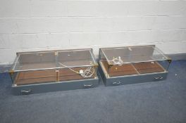 A PAIR OF TABLE DISPLAY CABINETS, with twin sliding trays/doors, led lighting, and grey painted