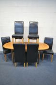 A NATHAN TEAK EXTENDING DINING TABLE, with a single fold out leaf, extended length 206cm x closed