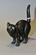 A WEDGWOOD ETRURIA BLACK BASALT CAT WITH GREEN GLASS EYES DESIGNED BY ERNEST LIGHT, impressed marks,