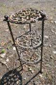 A WROUGHT IRON CIRCULAR THREE TIER STAND, with open fretwork, diameter 29cm x height 67cm (