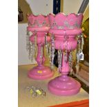 A PAIR OF VICTORIAN PINK GLASS LUSTRES, height 37.5cm, (2) (Condition report: one base has been