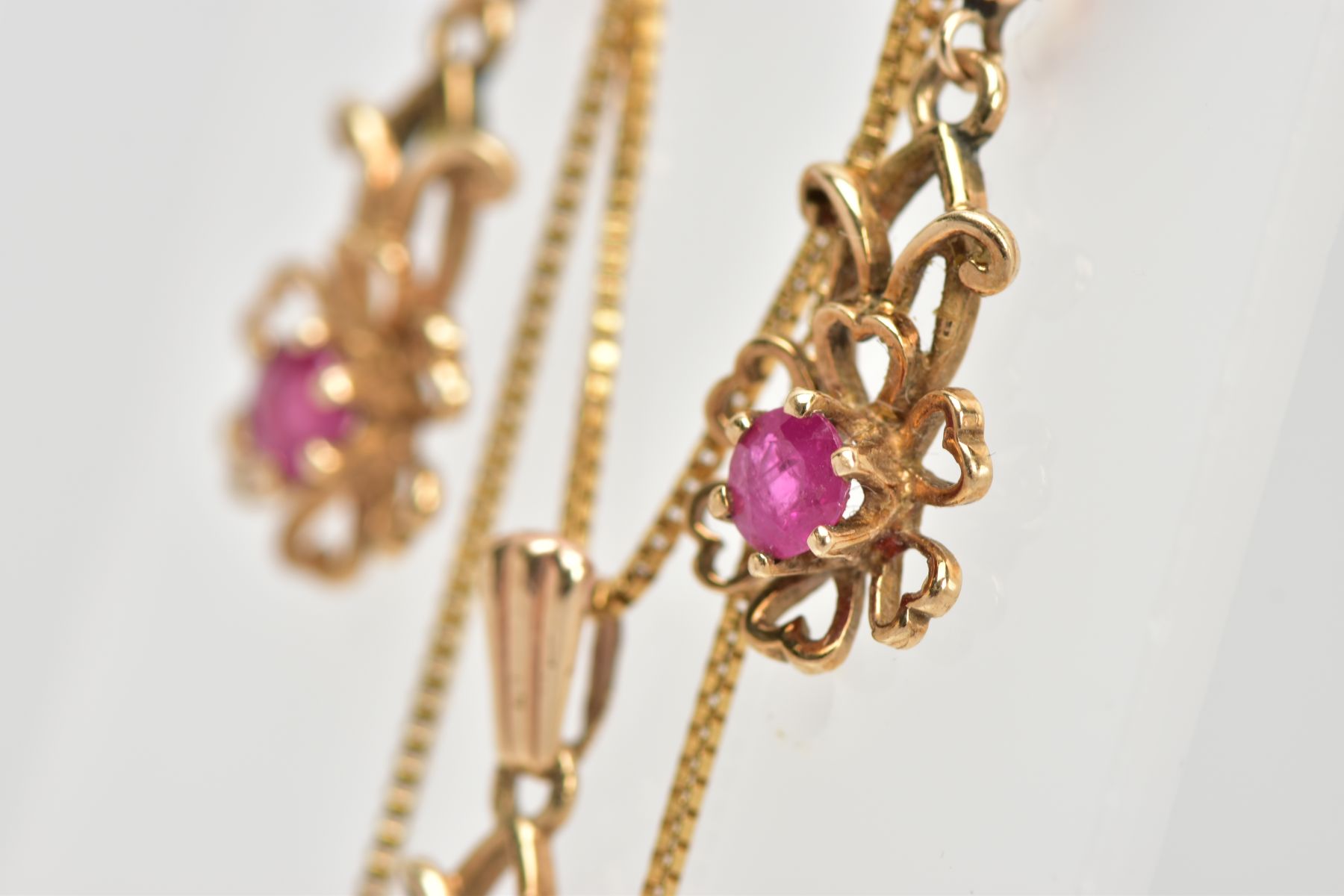 A MATCHING PENDANT NECKLACE AND EARRING SET, the pendant designed as an openwork flower, set with - Image 3 of 4