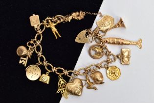 A 9CT GOLD CHARM BRACELET, twisted oval link bracelet fitted with a heart padlock clasp hallmarked