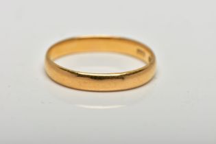 A 22CT GOLD BAND RING, a yellow gold courted band ring, approximate width 3.5mm, hallmarked 22ct