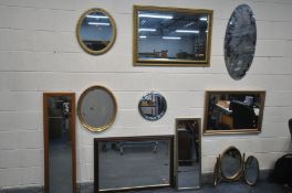 TEN VARIOUS WALL MIRRORS, of various styles, sizes and materials