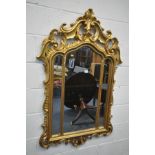 A LATE 20TH CENTURY FRENCH GILT FRAMED WALL MIRROR, 88cm x 134cm