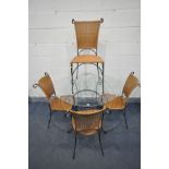 A WROUGHT IRON GLASS TOP DINING TABLE, diameter 100cm x depth 76cm and four wicker chairs (5) (