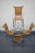 A WROUGHT IRON GLASS TOP DINING TABLE, diameter 100cm x depth 76cm and four wicker chairs (5) (